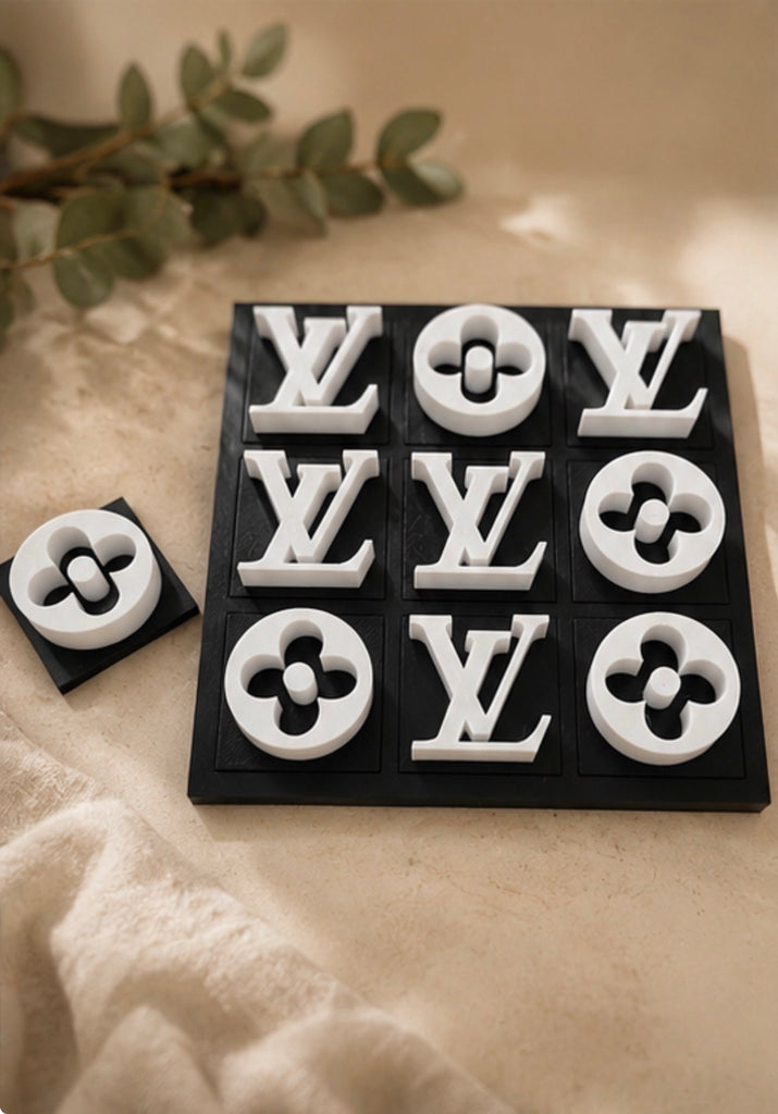 Tic tac toe game board with X and O pieces